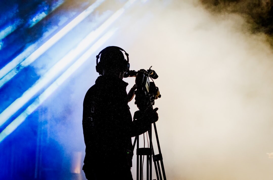 Camera operator filming during a live event