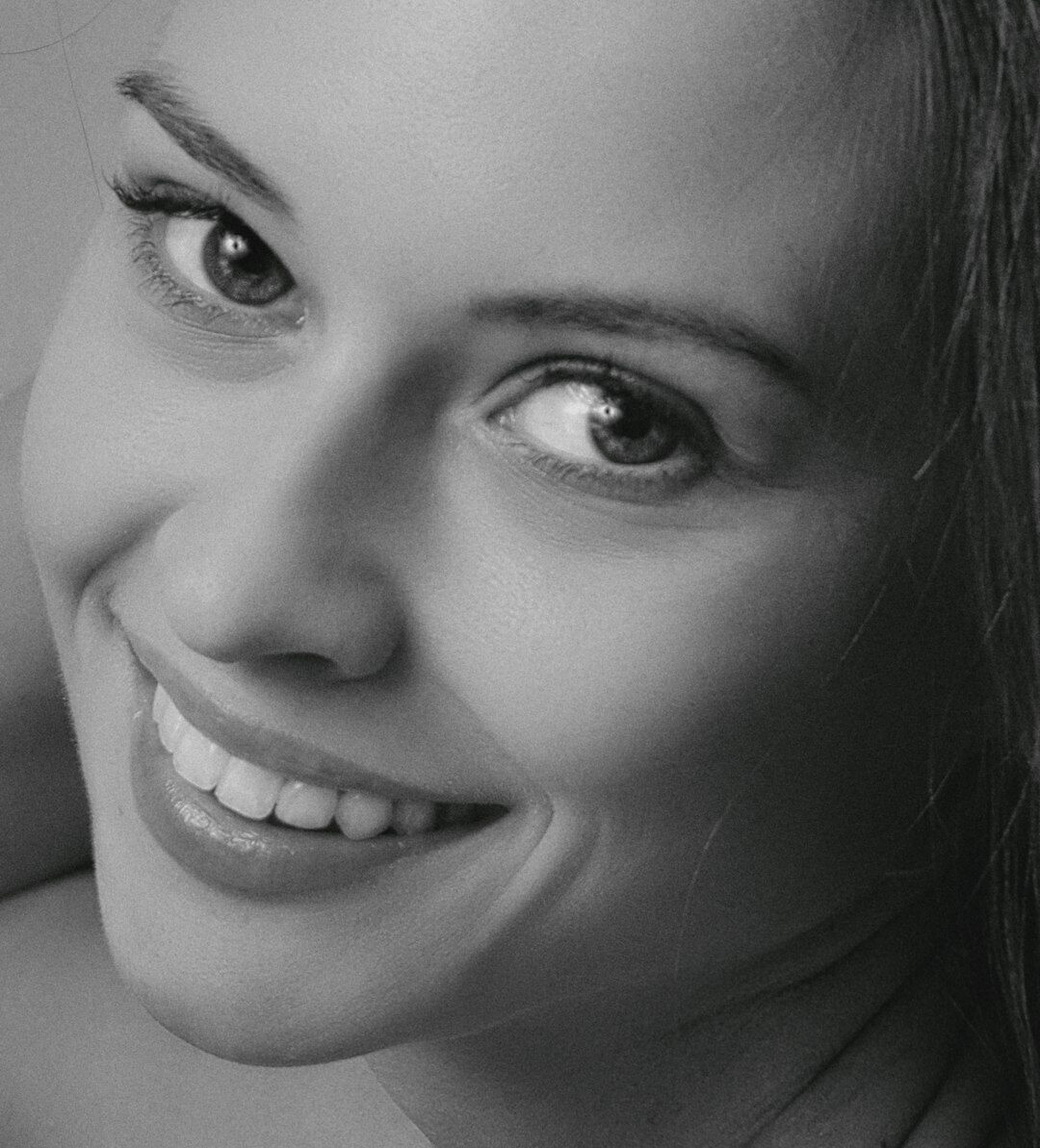 Studio portrait of a smiling European woman