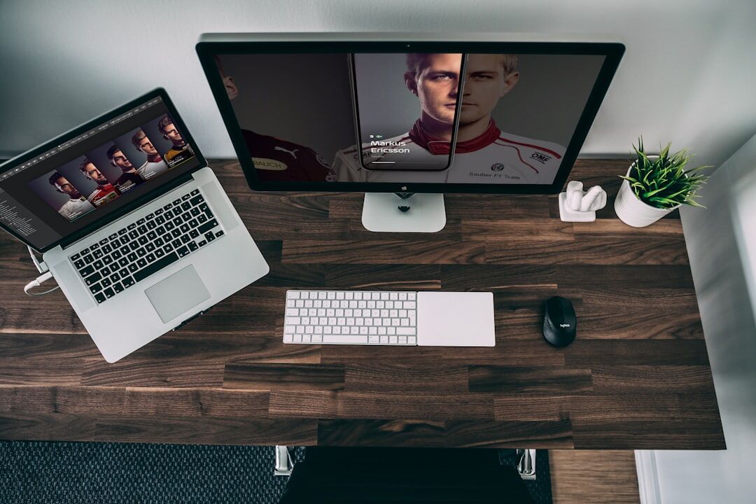 Overhead view of a desk with multiple video monitors