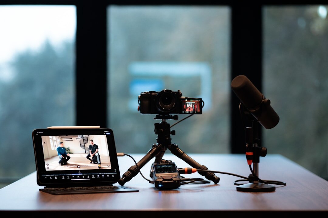 Professional broadcast camera on tripod in a studio